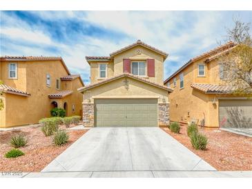 Charming two-story home with a well-manicured lawn and a spacious two-car garage at 3696 Via Geneva, Henderson, NV 89052