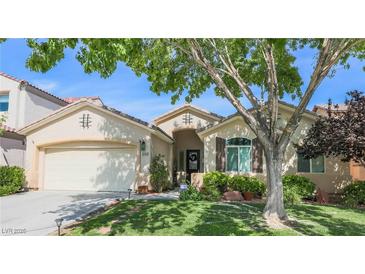 Charming single-story home featuring desert landscaping and a welcoming front entrance at 5844 Gushing Spring Ave, Las Vegas, NV 89131