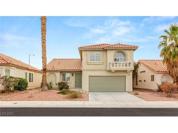 Charming two-story home featuring a well-maintained front yard, tile roof, and attached two-car garage at 3709 Misty Falls St, Las Vegas, NV 89129