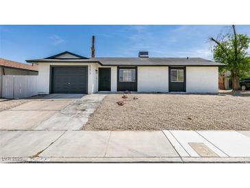 Charming single story home with xeriscaped front yard and integrated garage at 5273 Manassas Ave, Las Vegas, NV 89122
