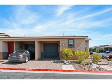 Charming single-story home with a well-maintained front yard and a convenient two-car garage at 2685 Crystal Blue St, Laughlin, NV 89029