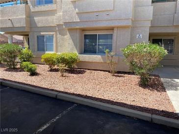 Inviting condo featuring low-maintenance landscaping and assigned parking space at 311 Manti Pl # 311, Henderson, NV 89014