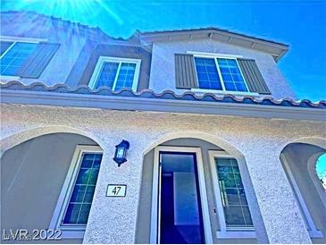 Charming two-story home with arched front entry and desert landscaping at 20 Barbara Ln # 47, Las Vegas, NV 89183