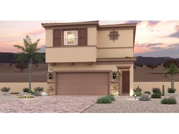 Two-story tan home featuring stone accents, a two-car garage, and desert landscaping at 888 Arbor Spring St, Henderson, NV 89011