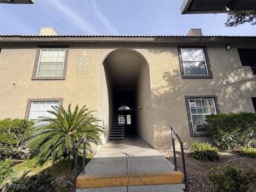 Attractive condo building features well-manicured landscaping and covered entry at 2606 S Durango Dr # 171, Las Vegas, NV 89117