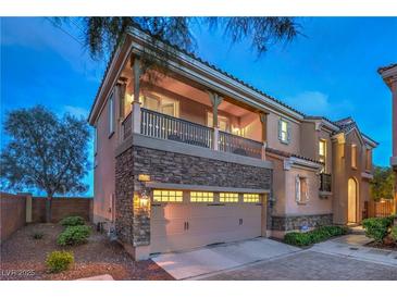 Charming two-story home with stone accents and a welcoming two-car garage at 11178 Corsica Mist Ave, Las Vegas, NV 89135