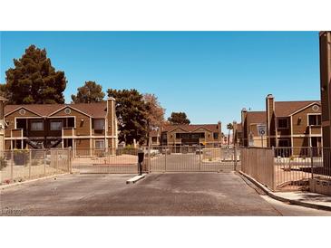 Exterior of community buildings showcasing its well-maintained landscaping and inviting entrance at 2685 Bryandouglas Dr, Las Vegas, NV 89121
