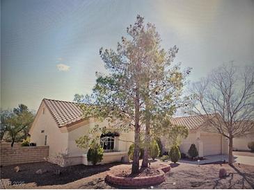 Charming single-story home with landscaped front yard and desert landscaping at 3104 Archwood Way, Las Vegas, NV 89134