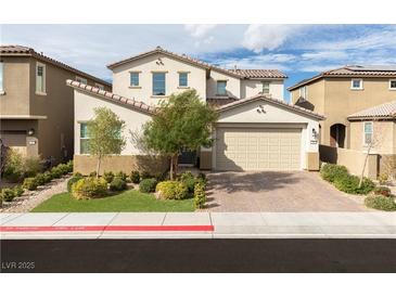 Charming two-story home with a two-car garage, lush landscaping, and a welcoming front yard at 16 Cresta Villa Ct, Henderson, NV 89011
