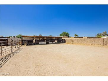 This horse property features ample outdoor space, shelters, and fencing, perfect for equestrian enthusiasts at 997 N Christy Ln, Las Vegas, NV 89110