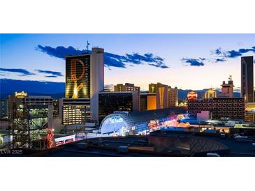 Striking city view of Las Vegas buildings and architecture with beautiful evening sky and light at 150 Las Vegas Blvd # 1507, Las Vegas, NV 89101
