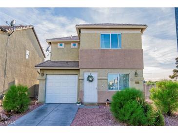 Charming two-story home with a well-maintained front yard and inviting entrance at 4195 Story Rock St, Las Vegas, NV 89115