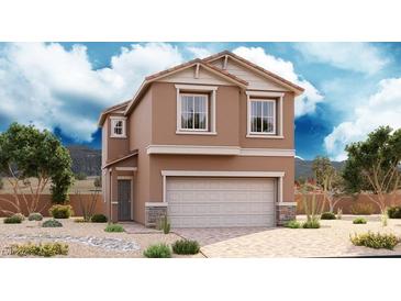 Charming two-story home with a two car garage and low maintenance desert landscaping at 1034 Ferodale Ave, North Las Vegas, NV 89084