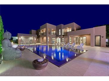 Stunning modern home featuring a luxurious pool and spa for ultimate relaxation and enjoyment at 3740 Caesars Cir, Las Vegas, NV 89120