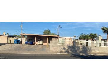 Single story home with covered parking and fenced yard at 4626 Sacks Dr, Las Vegas, NV 89122