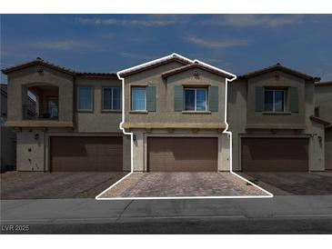 Two-story townhome featuring a private garage, well-maintained landscaping, and neutral color palette at 236 Callen Falls Ave # 1211, Henderson, NV 89011