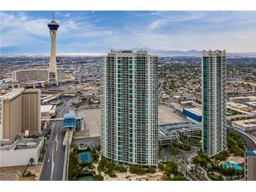 A high-angle shot showcases two modern high-rise buildings against the Las Vegas skyline at 322 Karen Ave # 2804, Las Vegas, NV 89109
