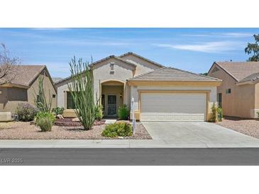 Charming single-story home with a well-manicured yard and desert landscaping at 1846 High Mesa Dr, Henderson, NV 89012