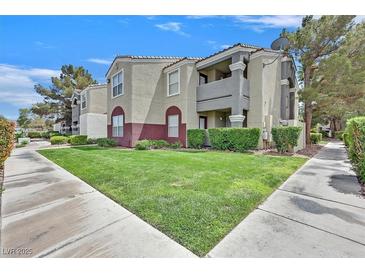Charming two-story condo with landscaped yard and private balcony, perfect for enjoying the outdoors at 5055 W Hacienda Ave # 1136, Las Vegas, NV 89118