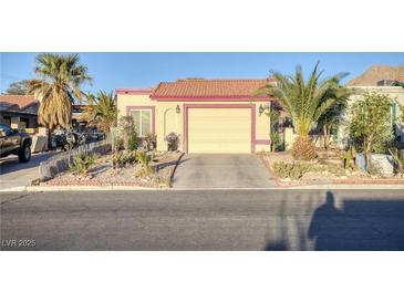 Charming one-story home with desert landscaping and attached two-car garage at 2380 Sierra Sunrise St, Las Vegas, NV 89156