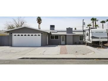 Charming single-story home featuring a well-maintained yard, attached garage, and RV parking at 3905 Casa Grande Ave, Las Vegas, NV 89102