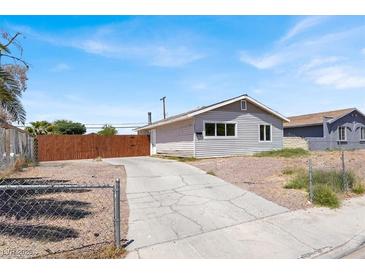 Charming single-story home featuring a well-maintained yard, driveway, and fenced perimeter at 2257 Colebrook St, Las Vegas, NV 89115