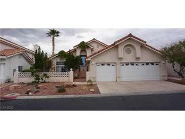 Charming single-story home featuring a two-car garage and well-maintained landscaping at 8052 Marbella Cir, Las Vegas, NV 89128