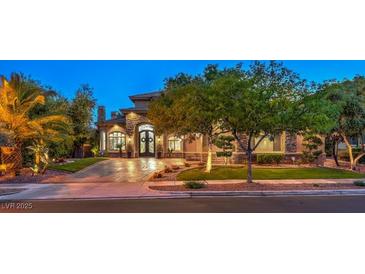 A charming single-Gathering home with a well-manicured lawn and mature trees creates great curb appeal at 3051 Traverse Creek Ln, Las Vegas, NV 89135