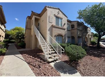 Attractive two-story condo with easy access stairs to the front door entrance at 3400 Cabana Dr # 1033, Las Vegas, NV 89122