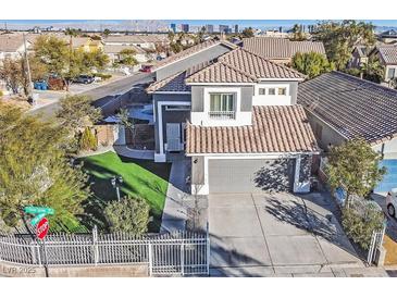 Charming two-story home with a well-manicured lawn and inviting curb appeal in a desirable community at 3738 Falcon Springs Dr, Las Vegas, NV 89147