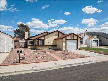 Charming single-story home with manicured front yard and attached garage in a quiet neighborhood at 7268 Wichita Ct, Las Vegas, NV 89119