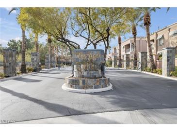 The Terraces on the Green entrance shows beautiful landscaping and well maintained grounds at 805 Dana Hills Ct # 104, Las Vegas, NV 89134