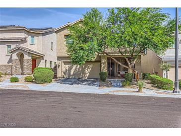 Charming two-story home with a two-car garage and well-maintained landscaping at 8091 Mosaic Sunrise Ln, Las Vegas, NV 89166