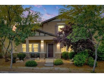 Charming two-story home with landscaped yard and cozy porch at 3141 Monet Sunrise Ave, Henderson, NV 89044