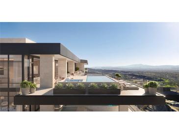 Modern rooftop pool and lounge area with stunning views at 400 Rock Peak Dr # 2402, Henderson, NV 89012
