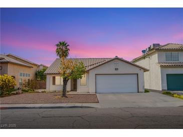 Charming single-story home featuring desert landscaping and an attached two car garage at 6274 Elderberry Wine Ave, Las Vegas, NV 89142