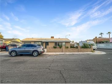 Charming single-story home with well-maintained front yard and mature landscaping at 4009 Patterson Ave, Las Vegas, NV 89104