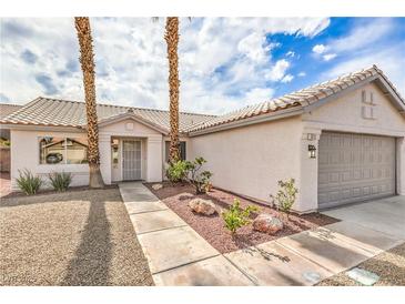 Charming single-story home features desert landscaping and a two-car garage at 7413 Red Eagle St, Las Vegas, NV 89131