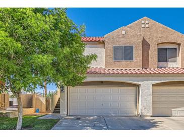 Charming two-story home featuring a two-car garage and well-maintained landscaping in a sunny location at 1672 Cloister Ave, Henderson, NV 89014