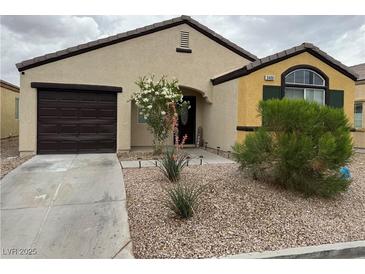 Charming single-story home featuring desert landscaping and a two-car garage at 3400 Denali Preserve St, Las Vegas, NV 89122