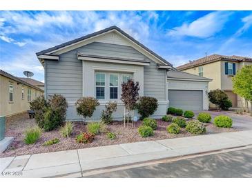 Charming single-story home featuring a well-manicured lawn and attractive curb appeal at 3144 Tronzano Ave, Henderson, NV 89044