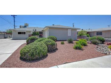 Charming single-story home with well-maintained front yard and landscaping at 6205 Parsifal Pl, Las Vegas, NV 89107