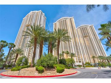 Beautiful high rise buildings with palm trees and lush landscaping in a sunny setting at 125 E Harmon Ave # 2907, Las Vegas, NV 89109