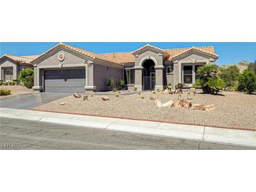 Charming single-story home with desert landscaping, covered entryway, and attached two-car garage at 2625 Youngdale Dr, Las Vegas, NV 89134