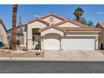 Charming single-story home featuring a two-car garage and low-maintenance desert landscaping at 8940 Emery Lake St, Las Vegas, NV 89123