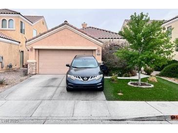 A charming single-Gathering home featuring a two-car garage and well-maintained landscaping at 6916 Gothic Marigold St, Las Vegas, NV 89149