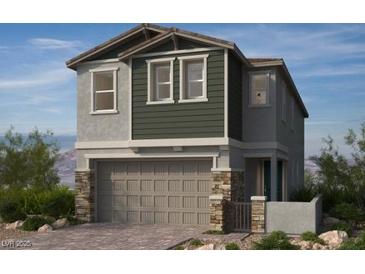 Charming home featuring a two-car garage and a blend of stone and siding accents at 155 Silver Run Ln, Las Vegas, NV 89138