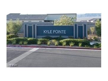 Welcoming entrance sign for the Kyle Pointe community with well-manicured landscaping at 10204 Kern Peak St, Las Vegas, NV 89166