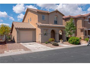 Two-story home featuring a tile roof, stucco exterior, and attached one-car garage at 5001 Volcanic Rock Ln, Las Vegas, NV 89122