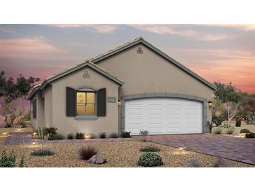 Charming single-story home featuring desert landscaping, a two-car garage, and a neutral color palette at 85 Serene Tempo Ave, Henderson, NV 89011